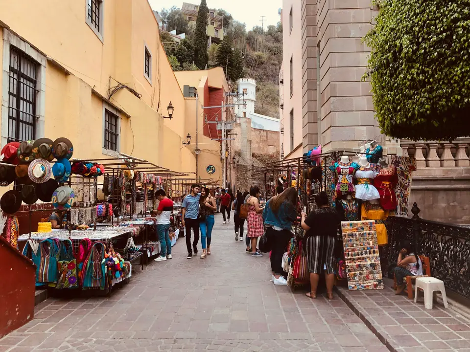 people walking on a street — Guanajuato