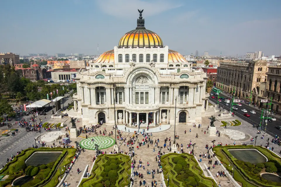 white and brown concrete building — Mexico City