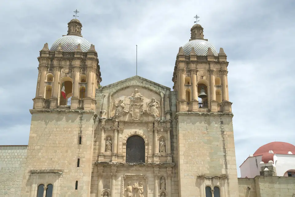 The ornate stone facade of the Templo de Santo Domingo de Guzmán in Oaxaca — Oaxaca
