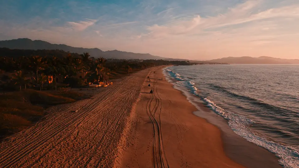 people at the beach during golden hour — Riviera Nayarit