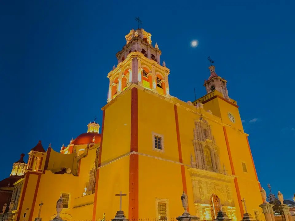 yellow painted concrete building — San Miguel de Allende